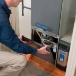 Technician working on Furnace electrics