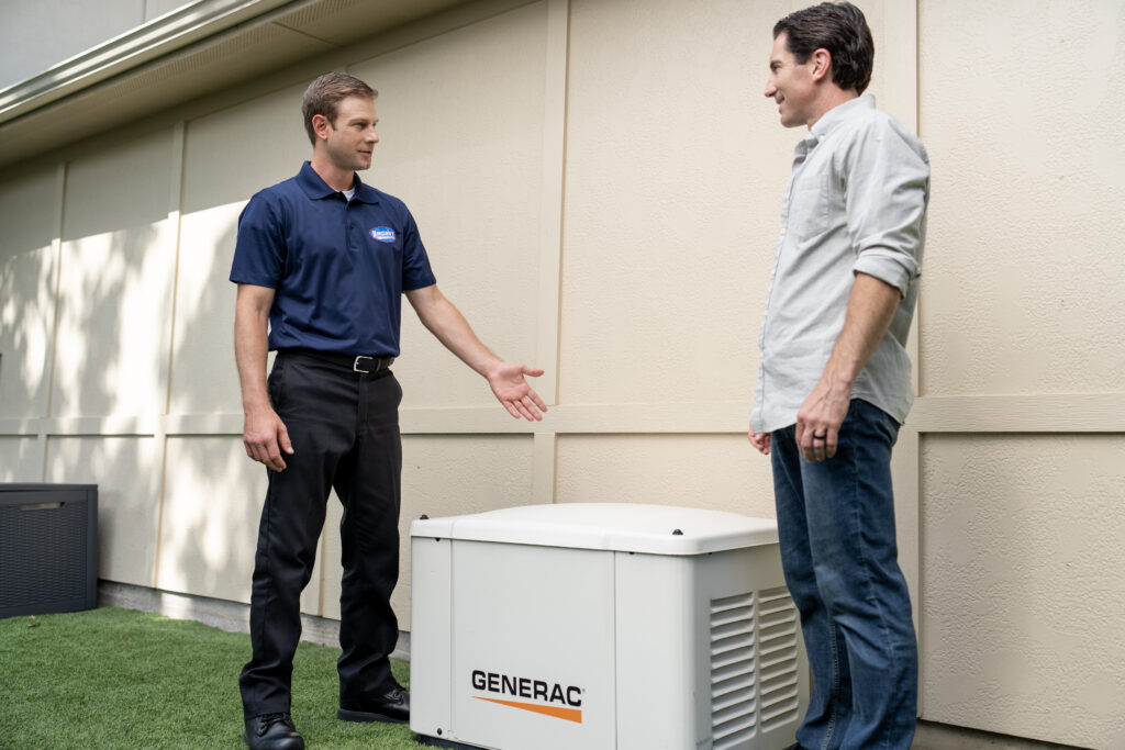 electrician speaking with customer about generator